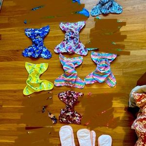 SOLD: Lot of 7 Buttons diaper covers and 10 Buttons inserts